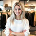 Young white woman in retail a little weighted but great smile